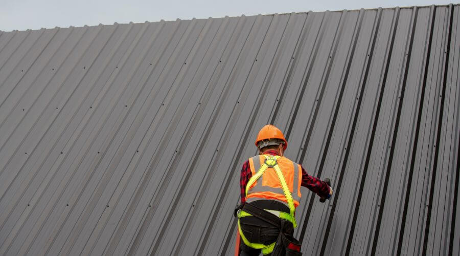 Professional metal roof installation services in Perrinton, MI